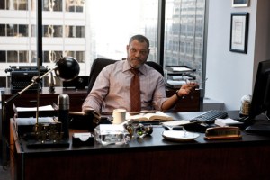 Laurence Fishburne as Perry White, editor in chief of The Daily Planet.